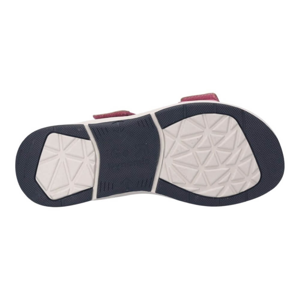 Close-up of a shoe sole with white tread pattern on a white background
