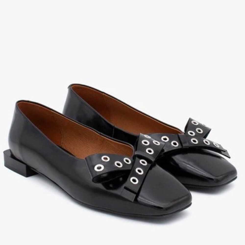 Black pointed-toe flats with silver embellishments and a black bow Ángel Alarcón Adelia 25504 Flat Leather Shoe-BLACK