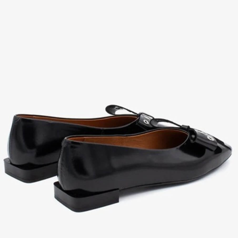 Black pointed-toe flats with silver embellishments and a black bow Ángel Alarcón Adelia 25504 Flat Leather Shoe-BLACK
