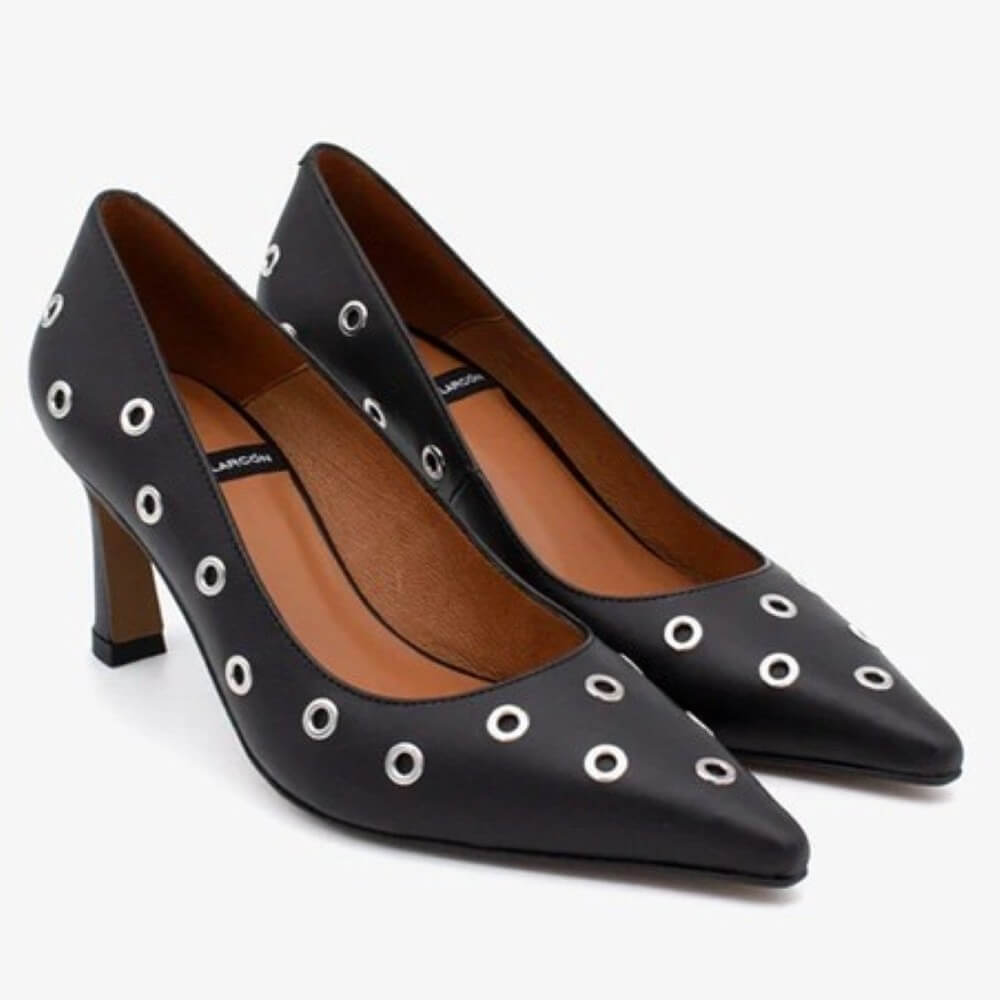 Black high-heeled shoe with sliver eyelet details on a white background Ángel Alarcón Adriene 25557 Leather Court Shoe-BLACK
