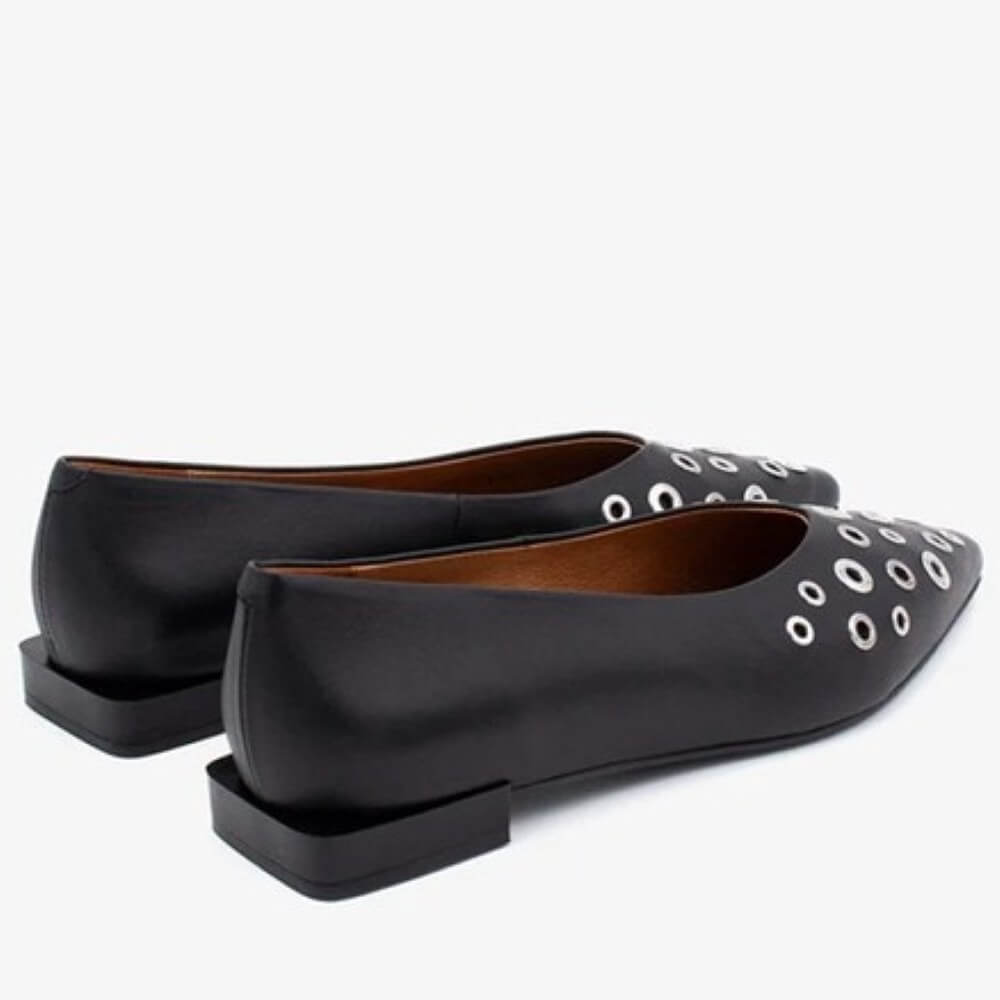 Black pointed-toe flats with silver eyelet details on a white background Ángel Alarcón Sila 25509 Flat Leather shoe-BLACK