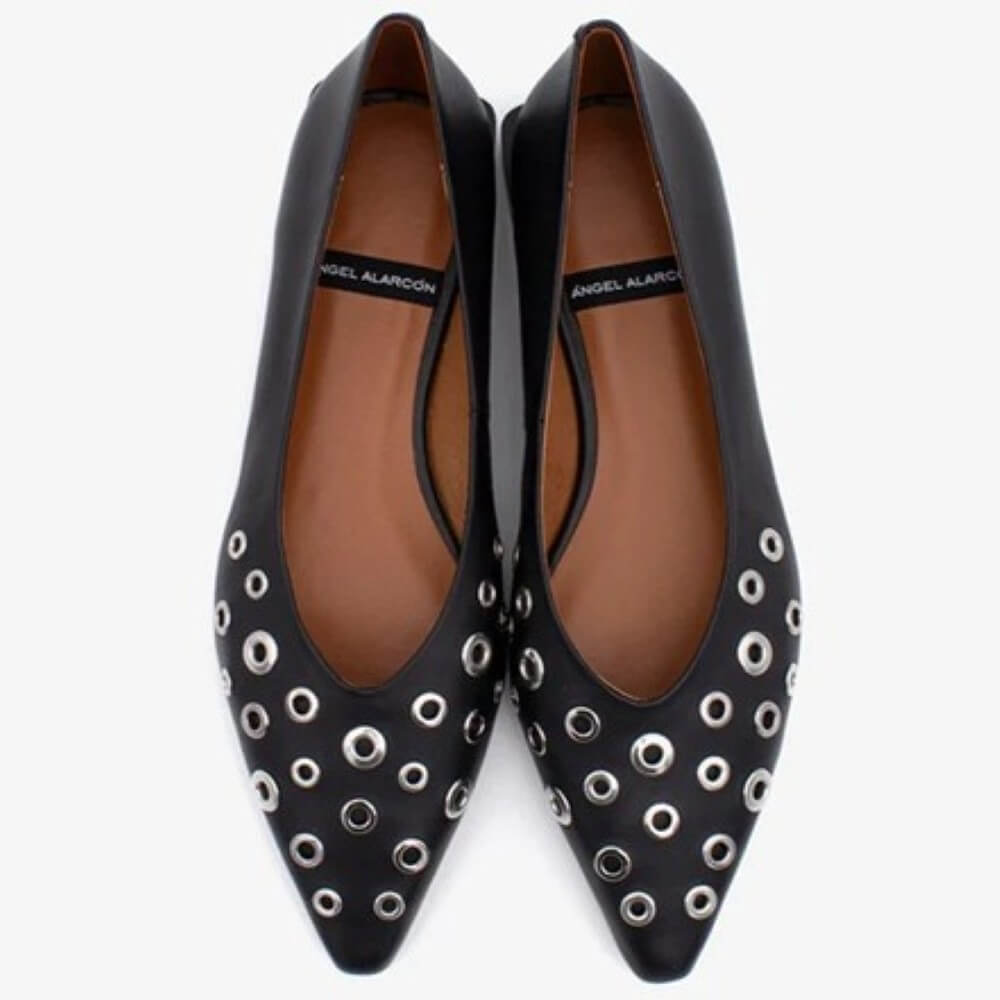 Black pointed-toe flats with silver eyelet details on a white background Ángel Alarcón Sila 25509 Flat Leather shoe-BLACK