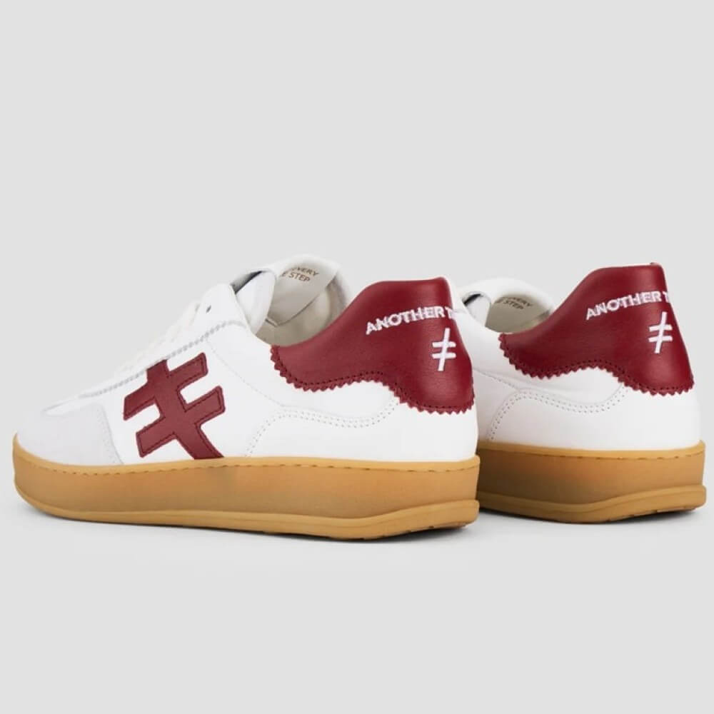 White sneaker with red logo and brown sole on a light gray background Another Trend Leather Sneakers A032-WHITE RED