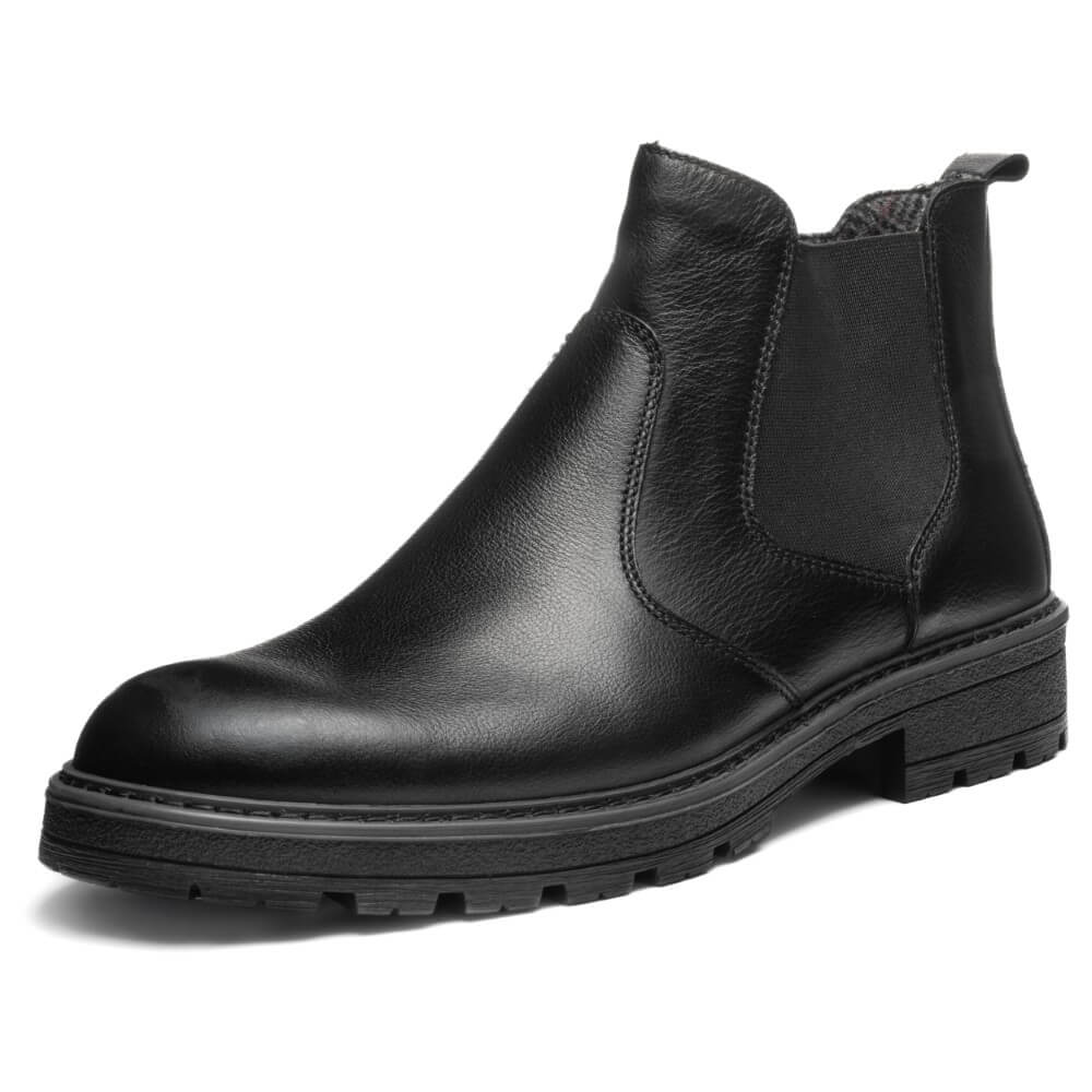 Black leather Chelsea boot on a white background