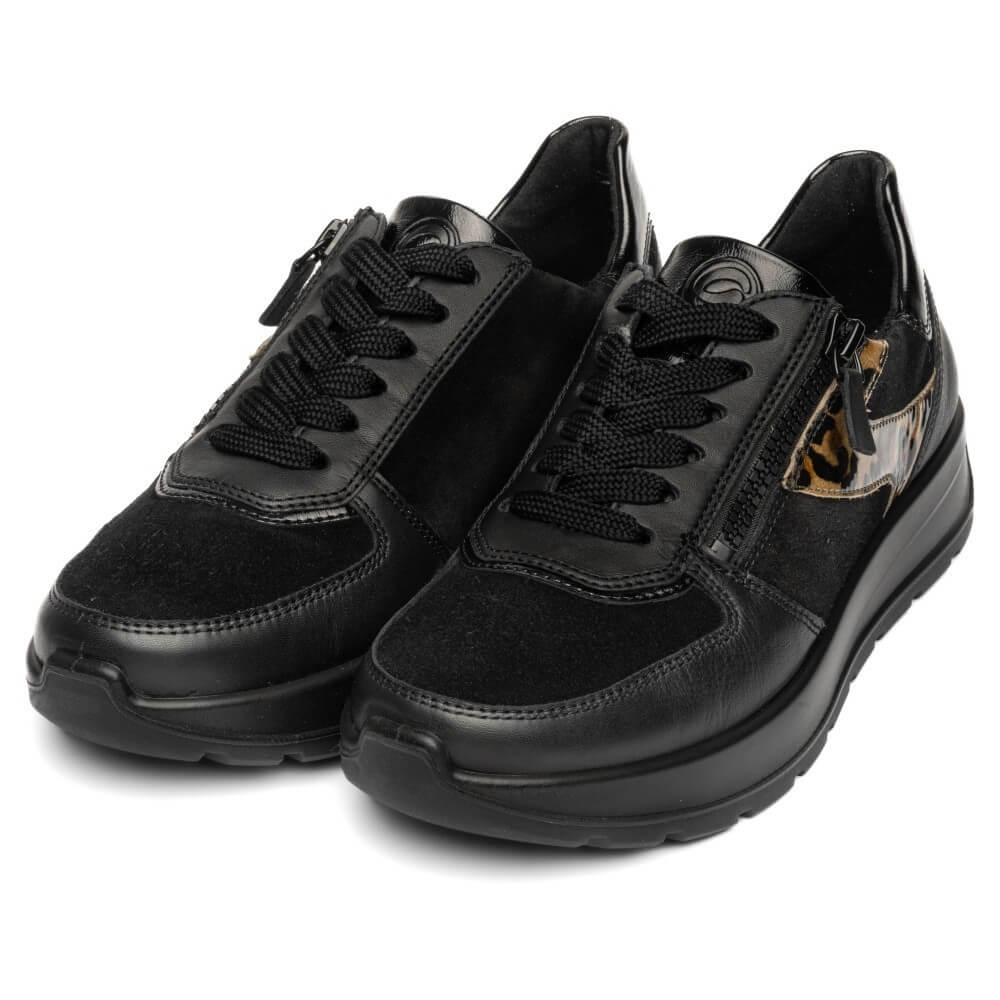 A pair of black Ara low-top sneakers with mixed leather and suede textures, black laces, and a small leopard-print accent on the side, shown against a plain white background.