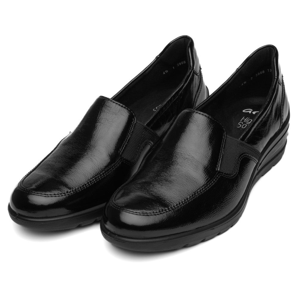 A pair of ara black leather slip-on loafers with a glossy finish, displayed on a clean white background.