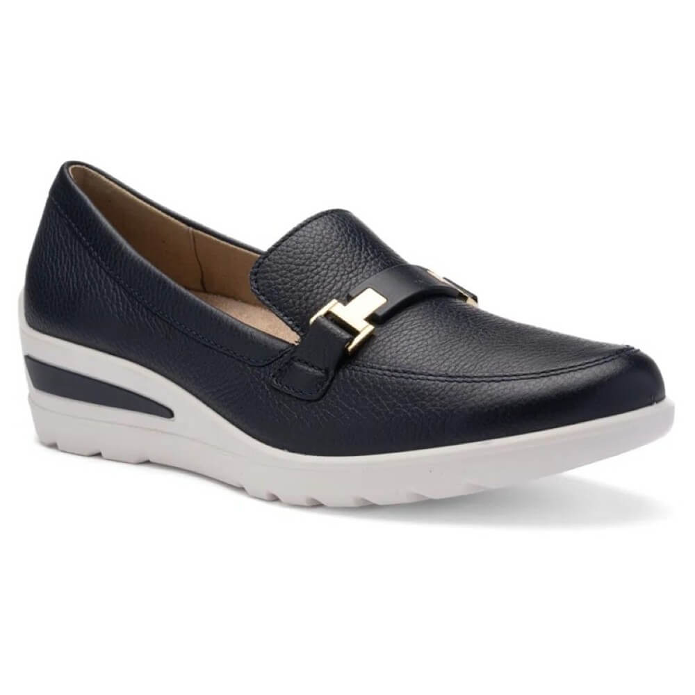 Navy loafer with gold buckle on a white background