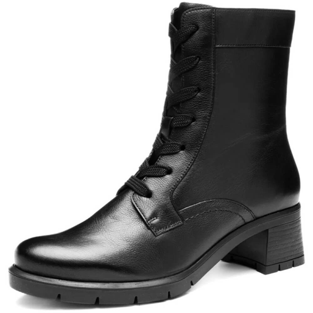 Black leather boot with a block heel on a white background