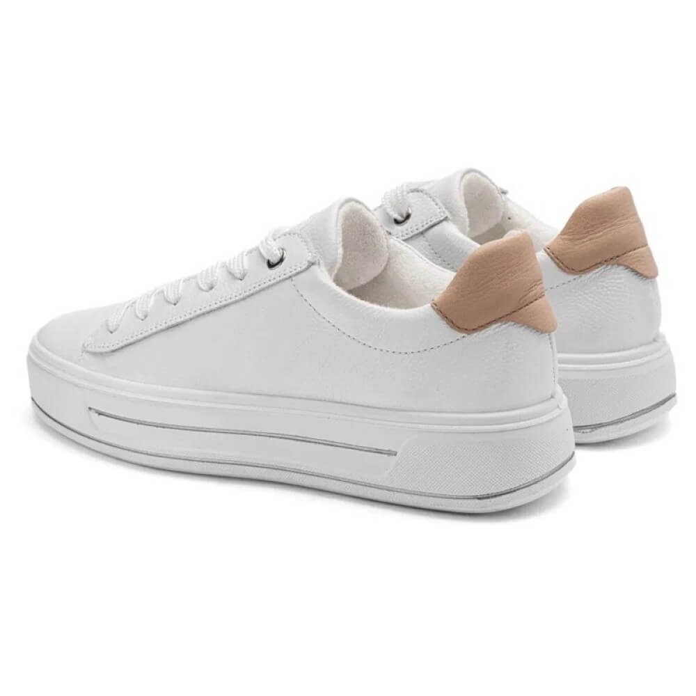 White sneakers with beige accents on a white background