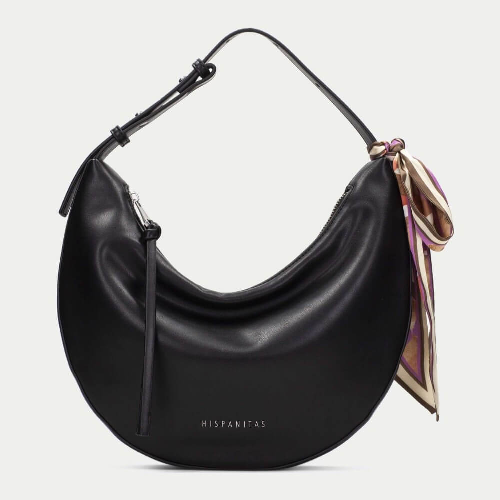 Black handbag with a colorful scarf attached, branded 'HISPANITAS', on a light gray background