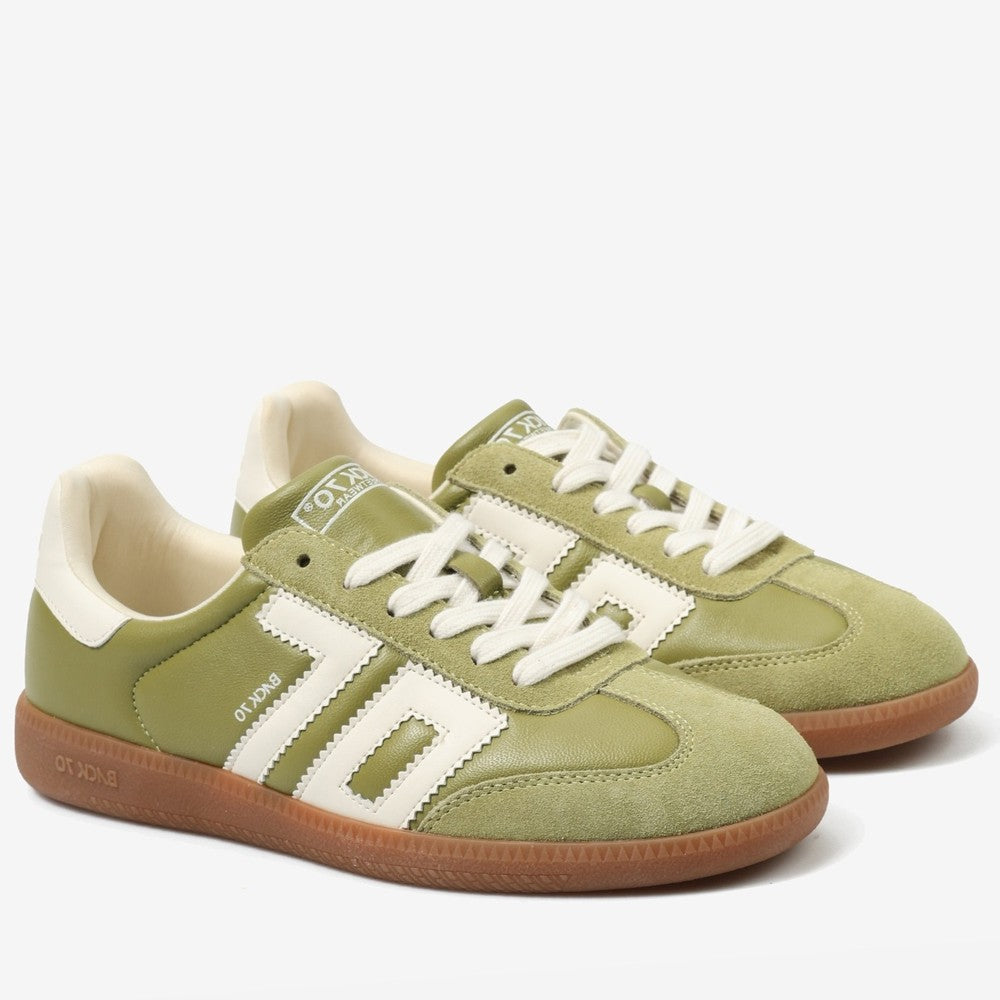Back 70 Green sneakers with white accents on a white background