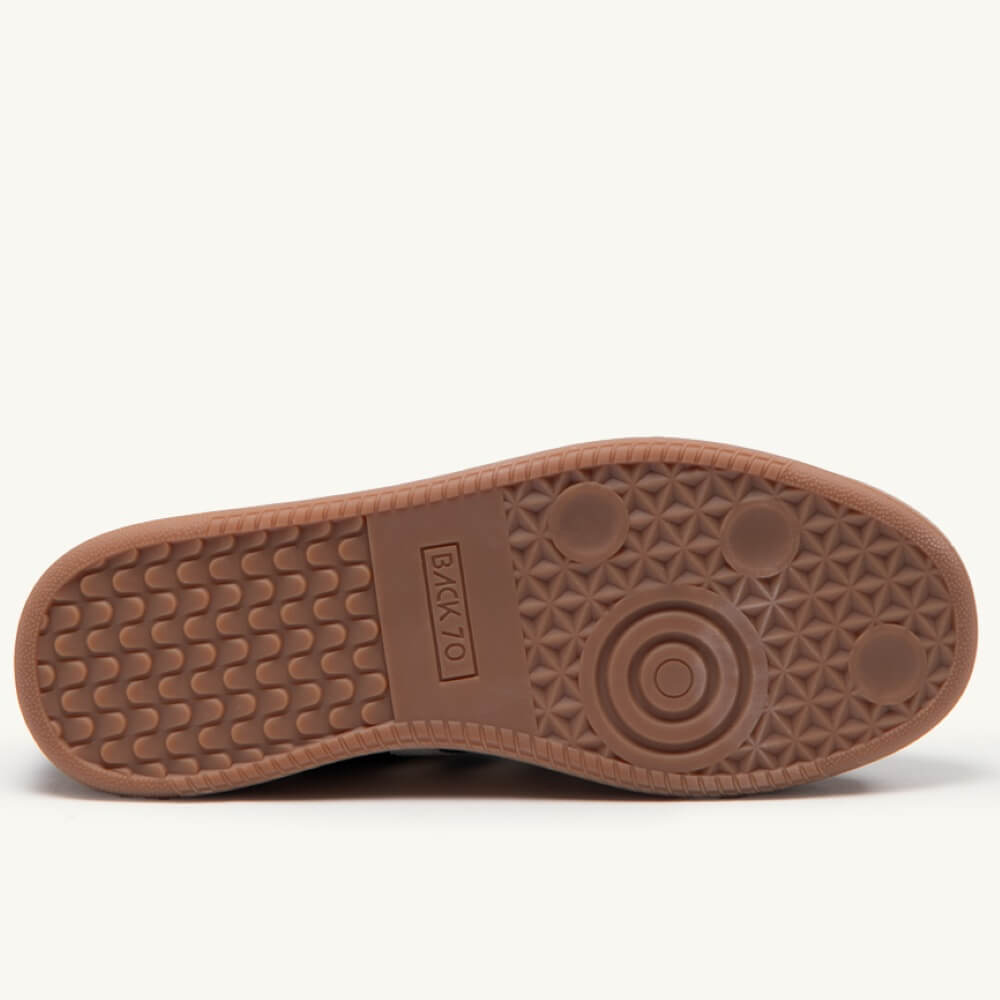 Back 70 Brown sole of a shoe with a brand logo on a white background