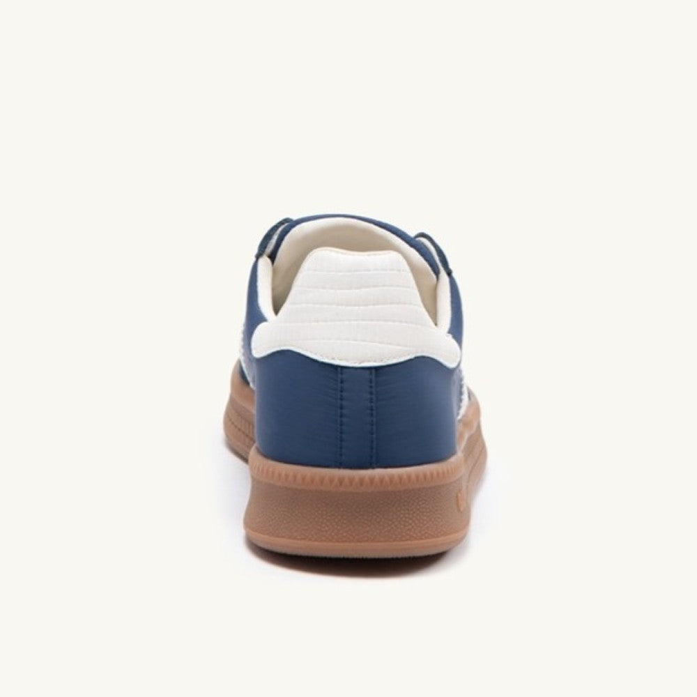 Back 70 Gents Navy blue and white sneaker with brown sole on a white background