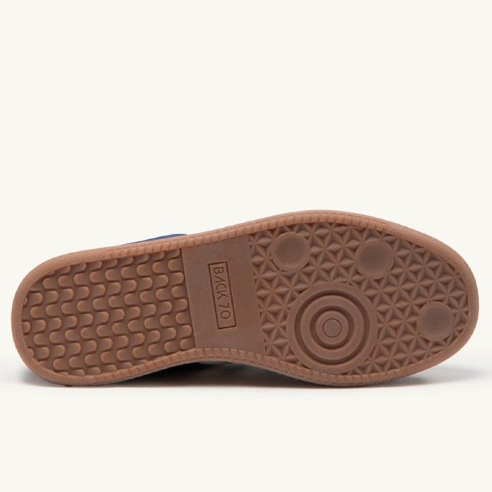 Back 70 gents Brown shoe sole with a brand logo on a white background