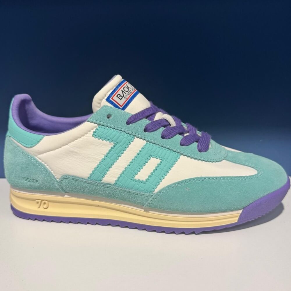 Back 70 Green sneakers on a blue background