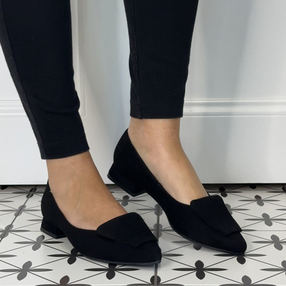 Bioeco Black Suede ballerinas worn with black jeans on a tiled floor