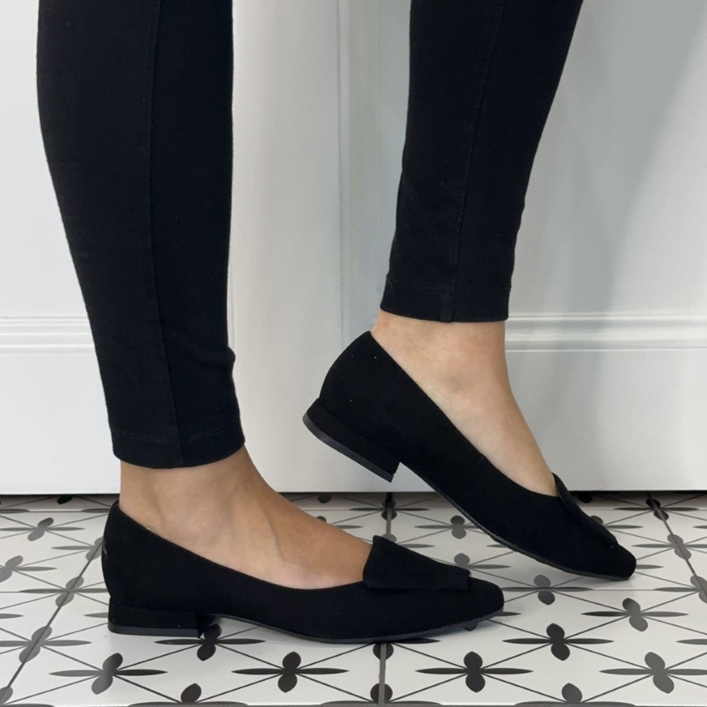 Bioeco Black Suede ballerinas worn with black jeans on a tiled floor