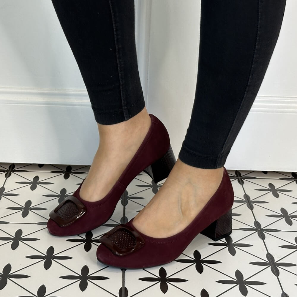 Burgundy shoes with a block heel worn by a person on a patterned floor. Bioeco 6883 H Fit Block Heel Burgundy Suede