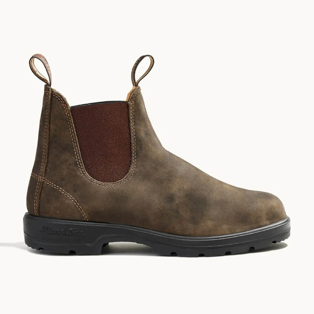 Brown leather boot with a brown lining on a white background