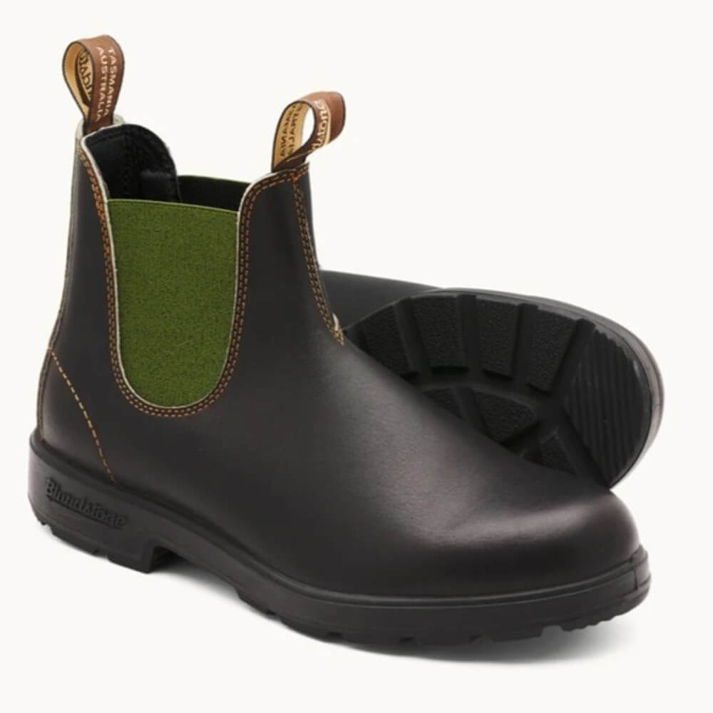 Brown rubber boots with green inner lining on a white background