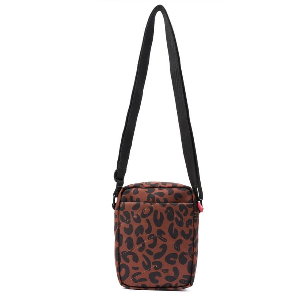 Crossbody bag with leopard print pattern on a white background