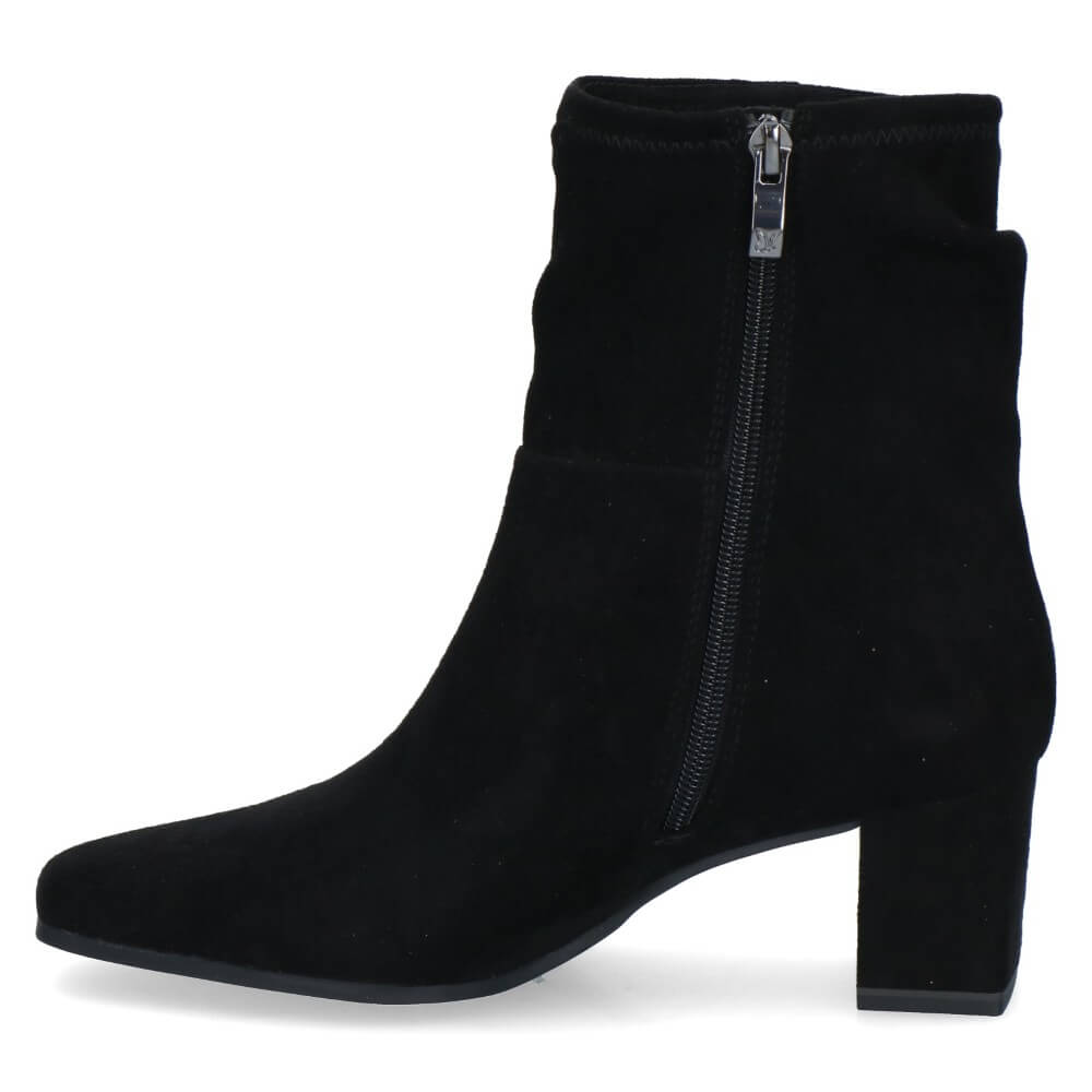 A caprice black suede ankle boot with a block heel and square toe and an inside zip, shown from a side profile on a white background.
