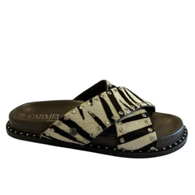 Carmela Zebra print sandal with studded details on a white background