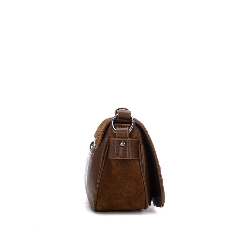 A Carmela brown leather shoulder bag shown from the side profile against a solid white background.