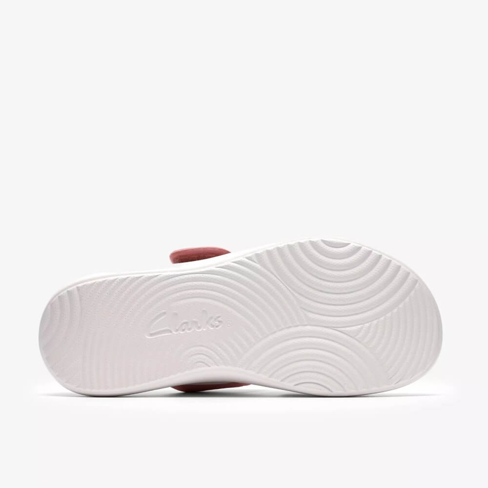 White sneaker sole with Clarks logo on a white background