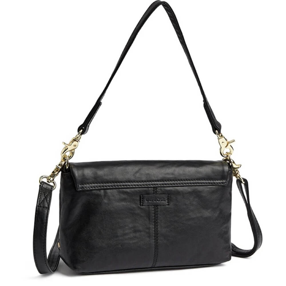 Black leather handbag with a strap on a white background