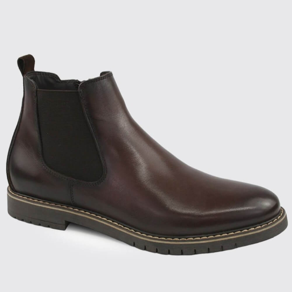 A Dubarry dark brown leather Chelsea boot with a black elastic side panel and a black treaded sole, shown from a side profile on a white background.
