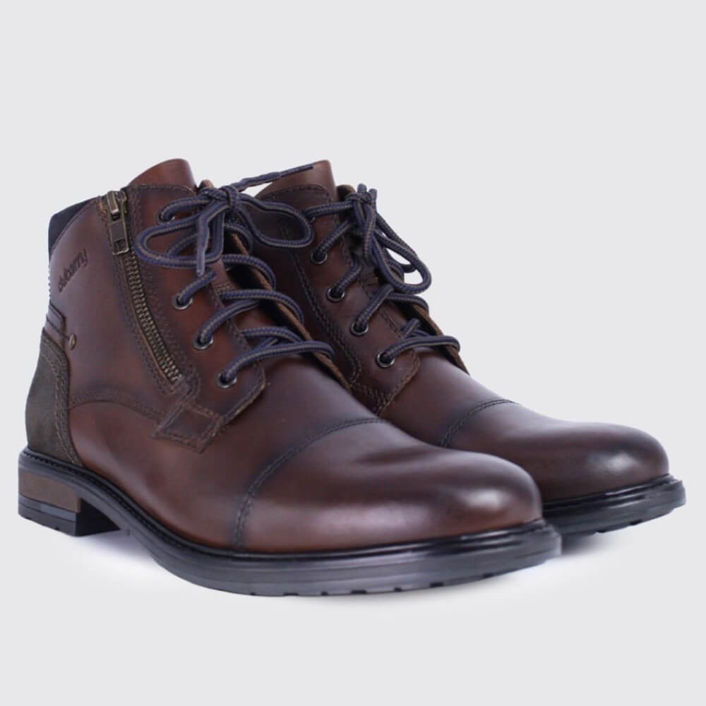 A pair of Dubarry dark brown leather lace-up ankle boots with a side zipper, dark laces, and a low stacked heel, shown on a light grey background.