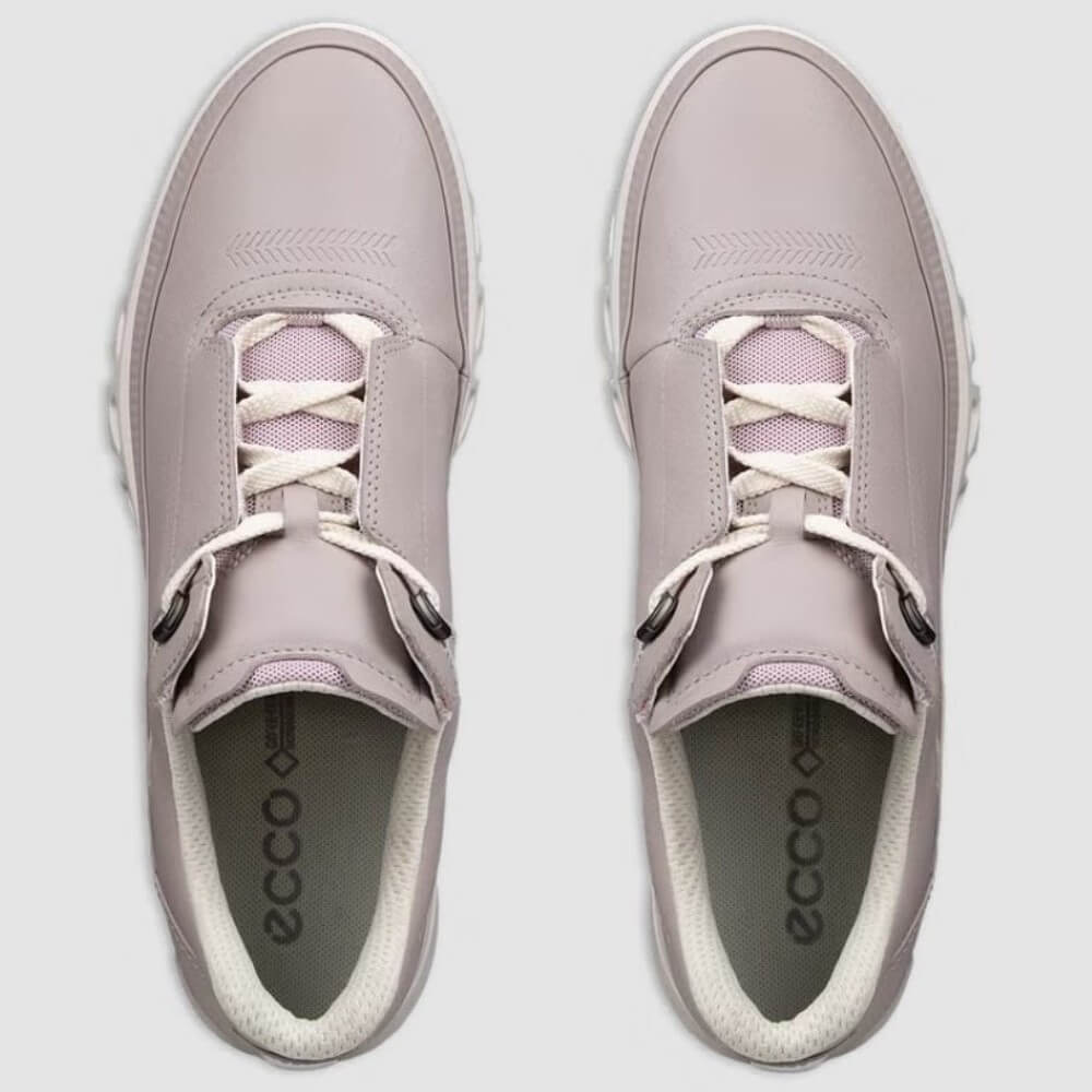 Pair of Ecco light purple sneakers with white laces on a light gray background