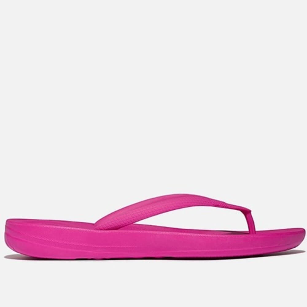 Pink flip-flop sandal on a white background