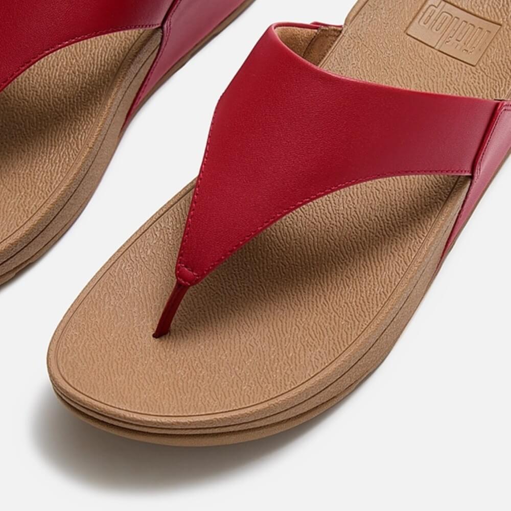 Fitflop Red sandal with tan insole on a white background