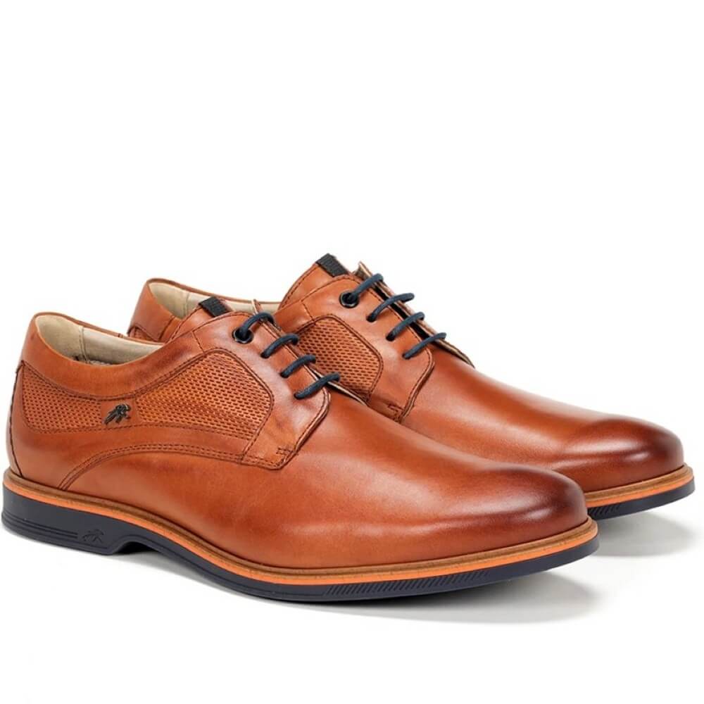 Pair of Fluchos brown leather shoes with black laces on a white background