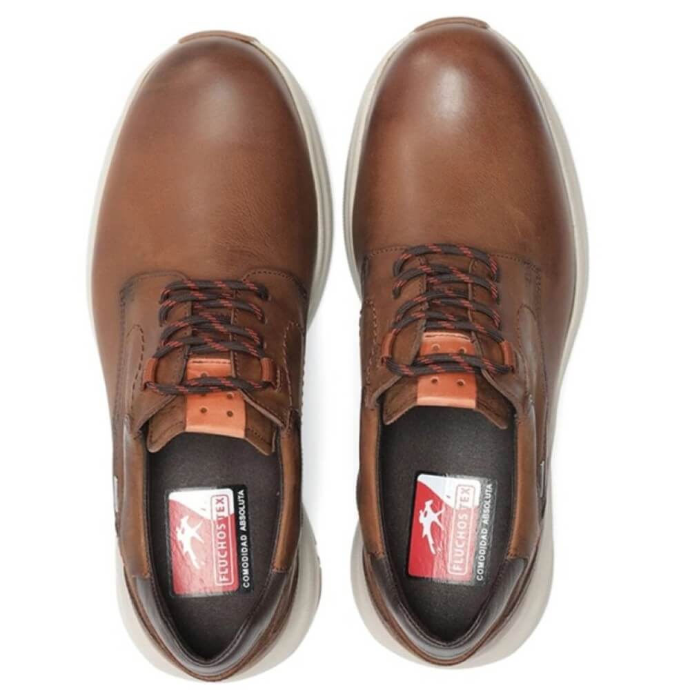 Brown leather shoe with white sole on a white background, featuring a waterproof label. Fluchos Triton TEX F2067 Waterproof Leather Laced Shoe Nut Brown