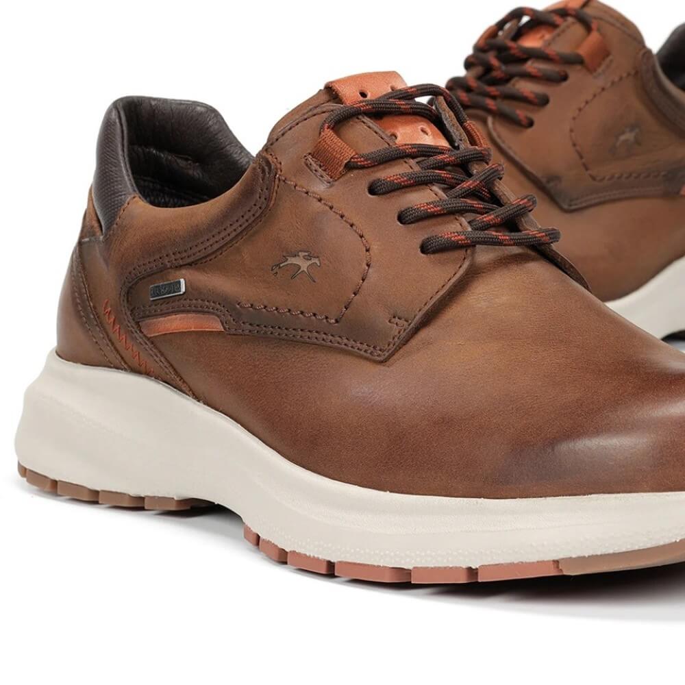 Brown leather shoe with white sole on a white background, featuring a waterproof label. Fluchos Triton TEX F2067 Waterproof Leather Laced Shoe Nut Brown