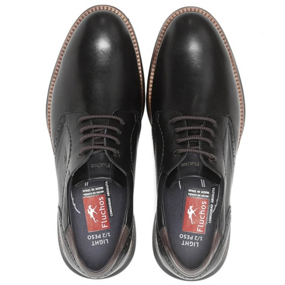 Black leather shoe with brown accents on a white background Fluchos William Leather Shoe F1351