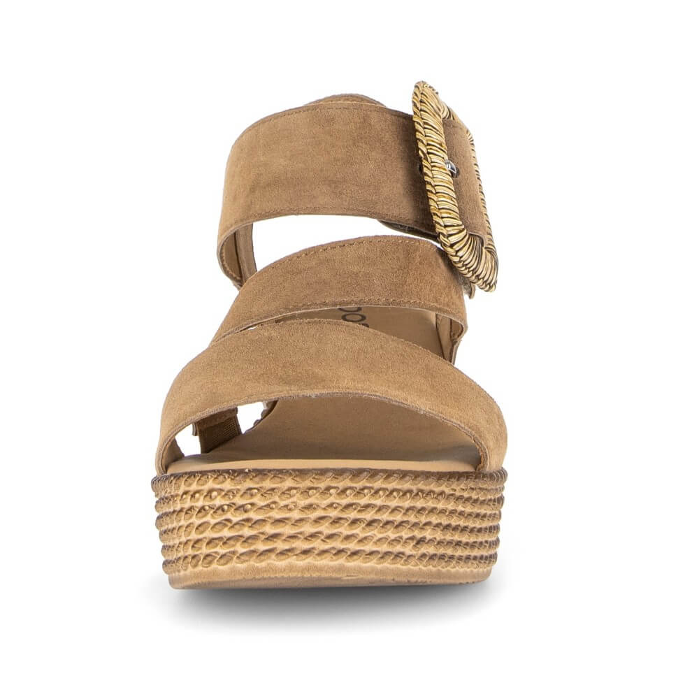 Gabor Tan wedge sandal with a golden buckle on a white background