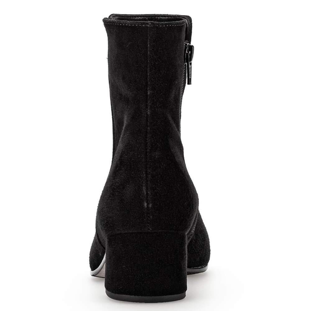 Gabor Black suede ankle boot with a block heel and side zipper, shown from a rear three-quarter view on a white background.