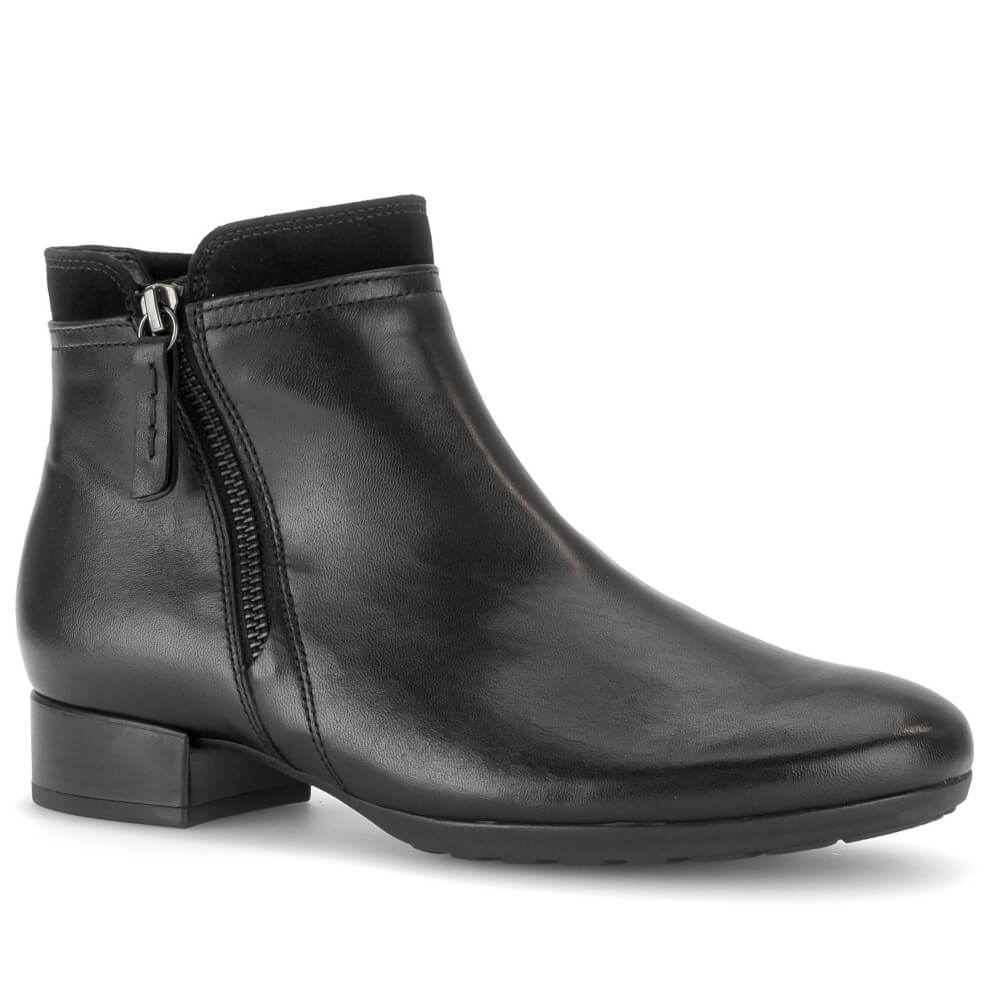 A Gabor black leather ankle boot with a side zipper, low block heel, and rounded toe, shown from a three-quarters angle on a white background.