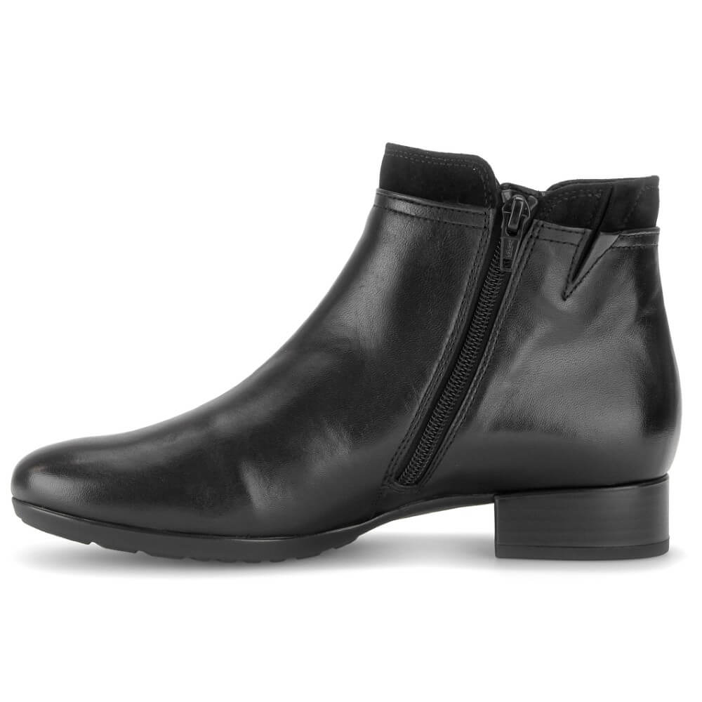 A Gabor black leather ankle boot with a side zipper, low block heel, and rounded toe, shown in profile against a white background.