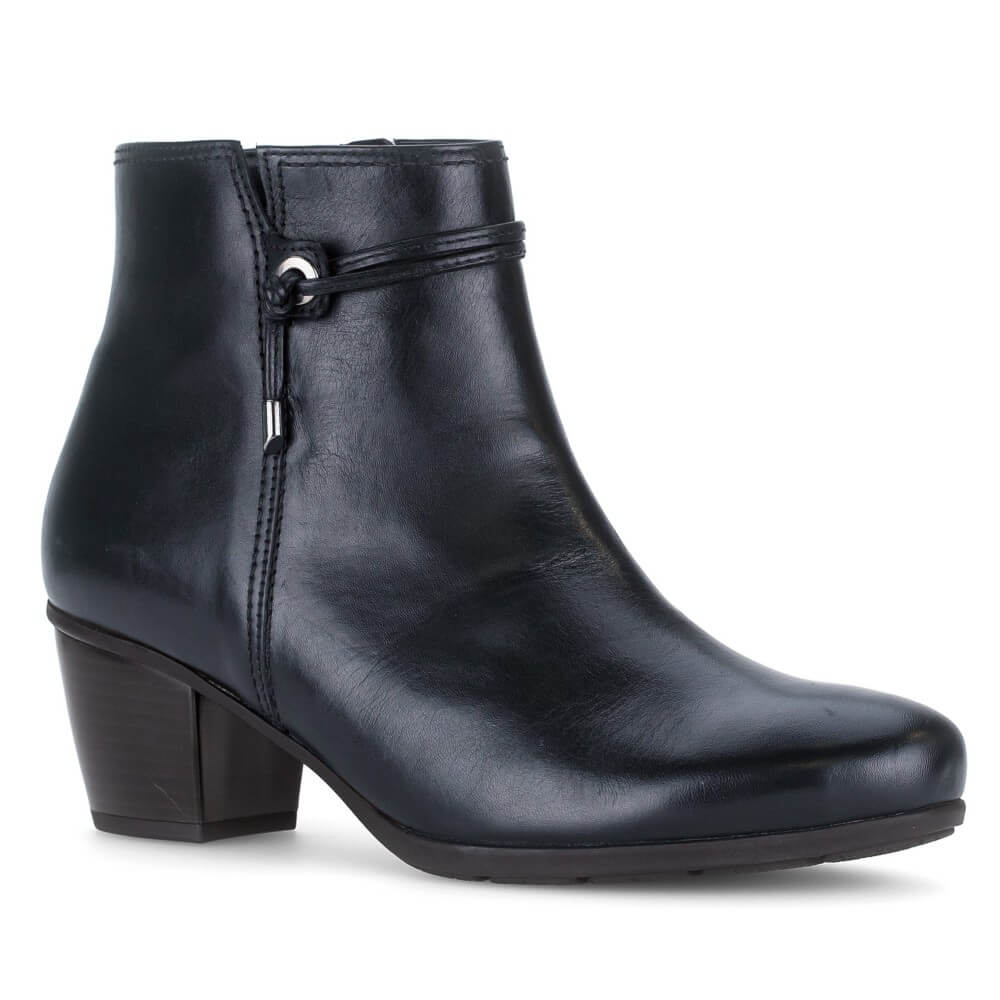 A Gabor Navy leather ankle boot with a low block heel, a side zipper, and a decorative strap detail with silver hardware on the side collar, shown against a plain white background.