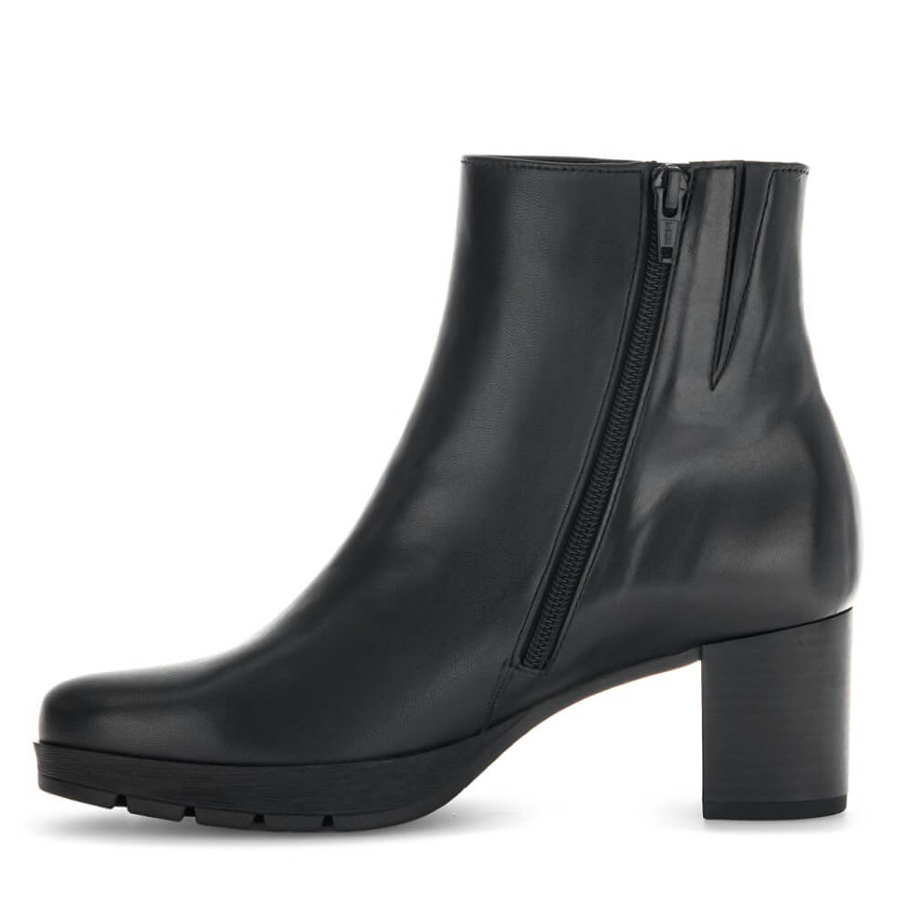 A Gabor black leather ankle boot with a chunky block heel, a side zipper, shown from a side profile on a white background.