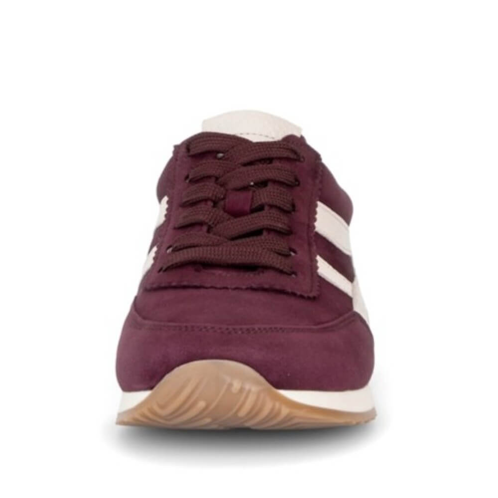 A single Gabor brand low-top sneaker shown from a side view. The shoe features a mulberry wine suede upper with white leather side stripes, beige lining, and brown laces, set against a plain white background.