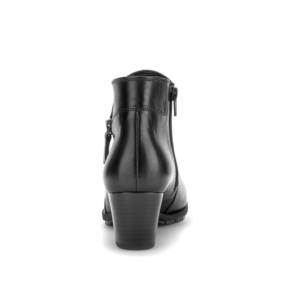 A Gabor black leather ankle boot with a block heel, shown from a rear three-quarter view on a white background.