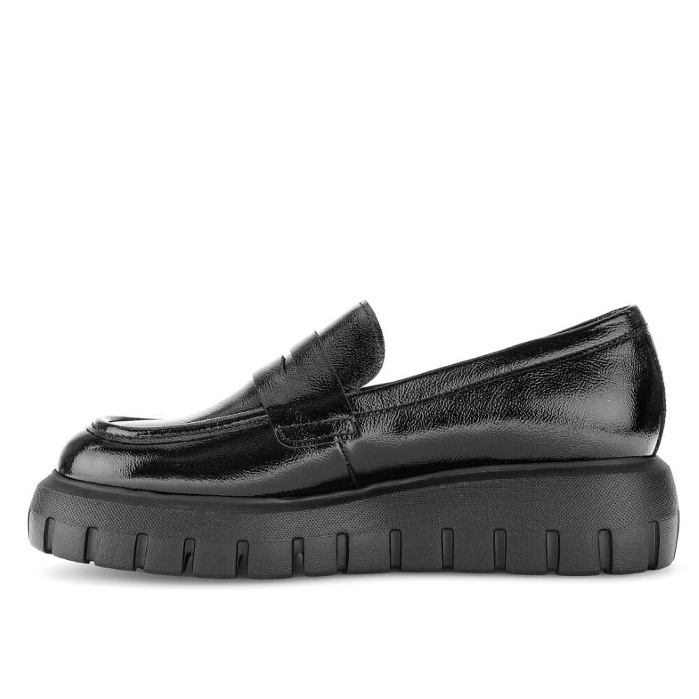 A Gabor black leather penny loafer with a chunky, ribbed platform sole, shown in a side profile view against a plain white background.