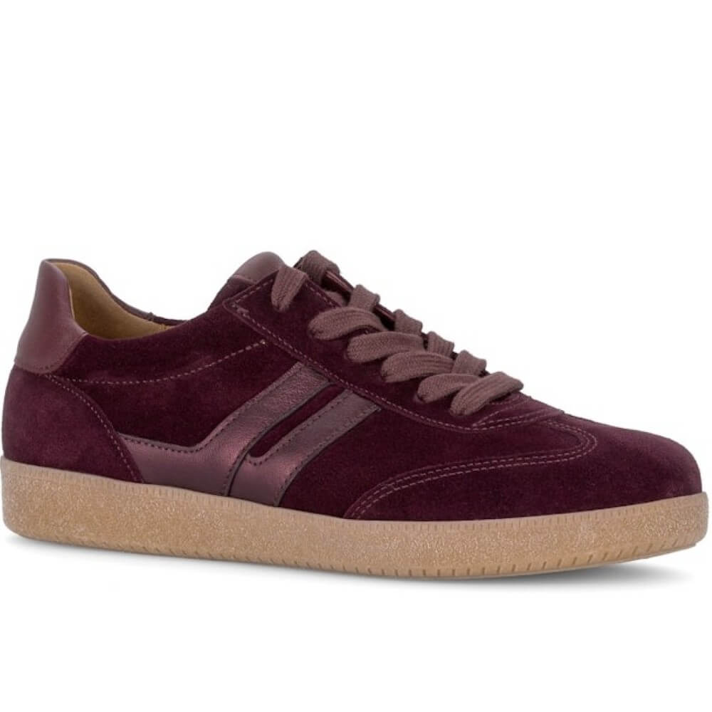 Gabor low-top suede sneaker in deep burgundy with matching laces and side stripes, featuring a light tan rubber sole, shown in a side profile on a white background.