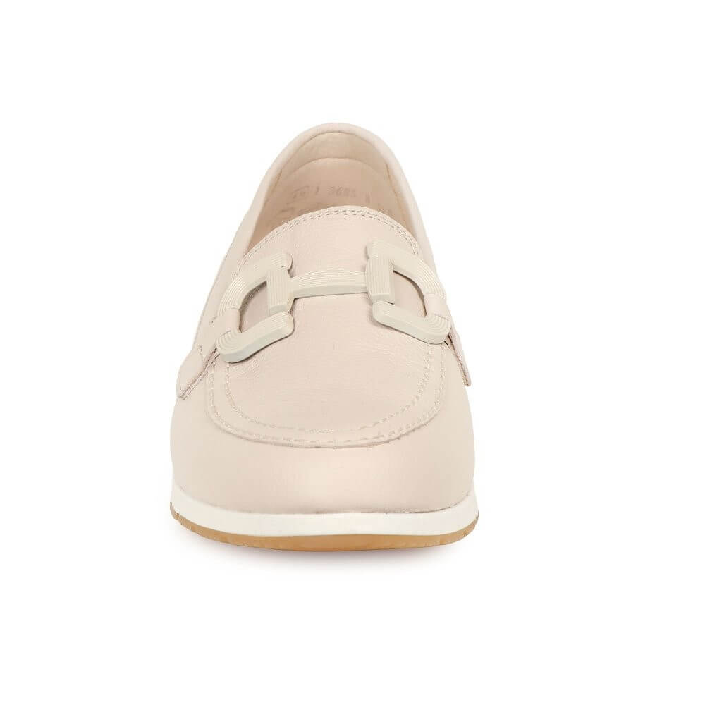 Beige loafer shoe on a white background